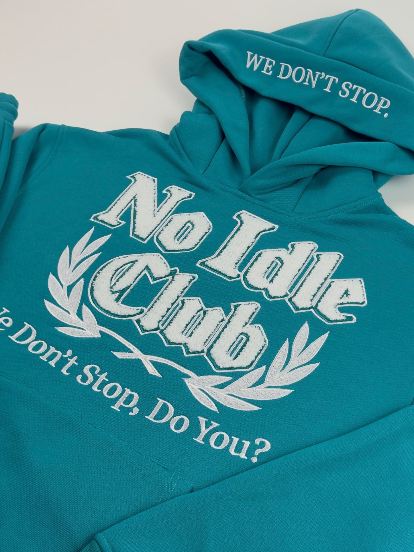 The Qualifying Set Teal/White hoodie
